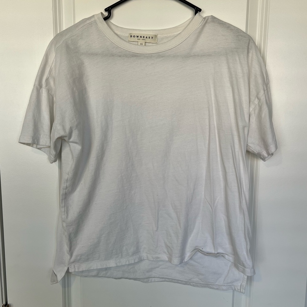 White tee. Has small slits in sides, worn once.